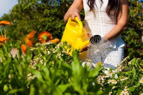 Gardener Barnes team using PPE while working in a garden